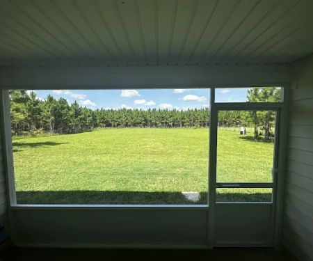 Affordable Seamless Gutters and Screen Enclosures