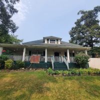 Dolly's Roofing, Inc. ico