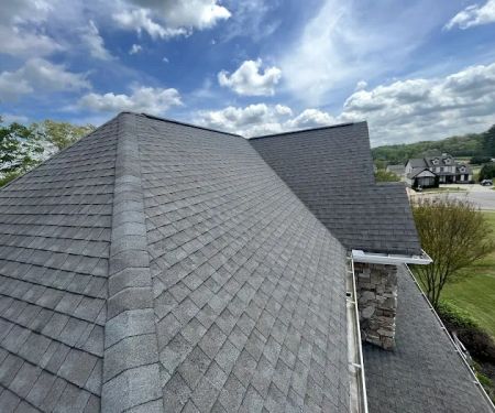 Artisan Roofing & Construction