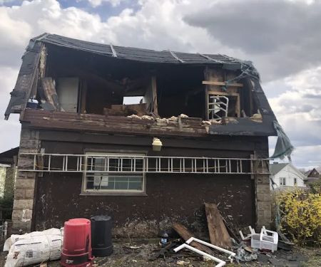 Nail'Em Down Roofing