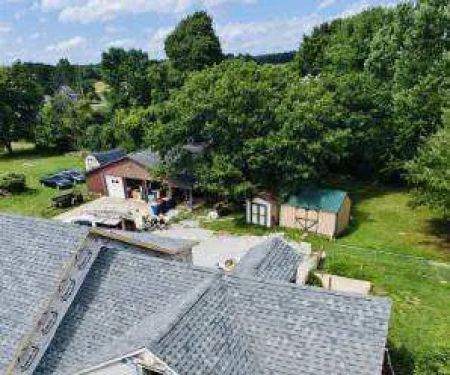 Over The Top Roofing & Exteriors