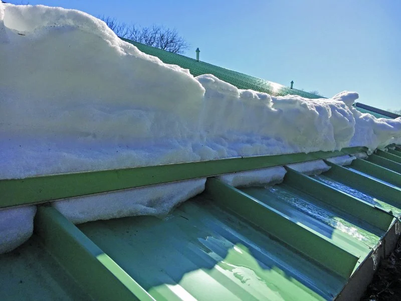 How to Manage Roof Load and Prevent Damage from Snow or Debris