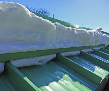 How to Manage Roof Load and Prevent Damage from Snow or Debris