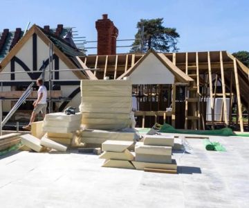 How to Choose Roofing for Flat vs Pitched Garages & Sheds