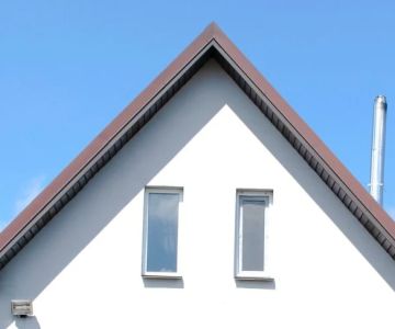 How Roof Pitch & Overhang Protect Exterior Walls: Key Benefits Explained